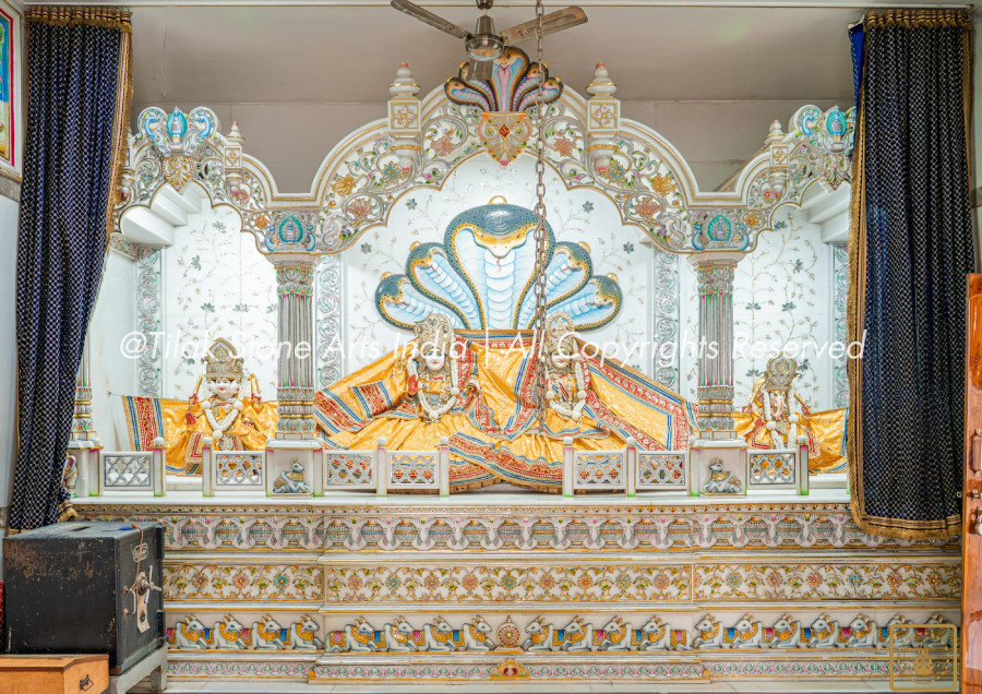 Grandeur in Devotion: The Majestic Presence of a Big White Marble Home Temple